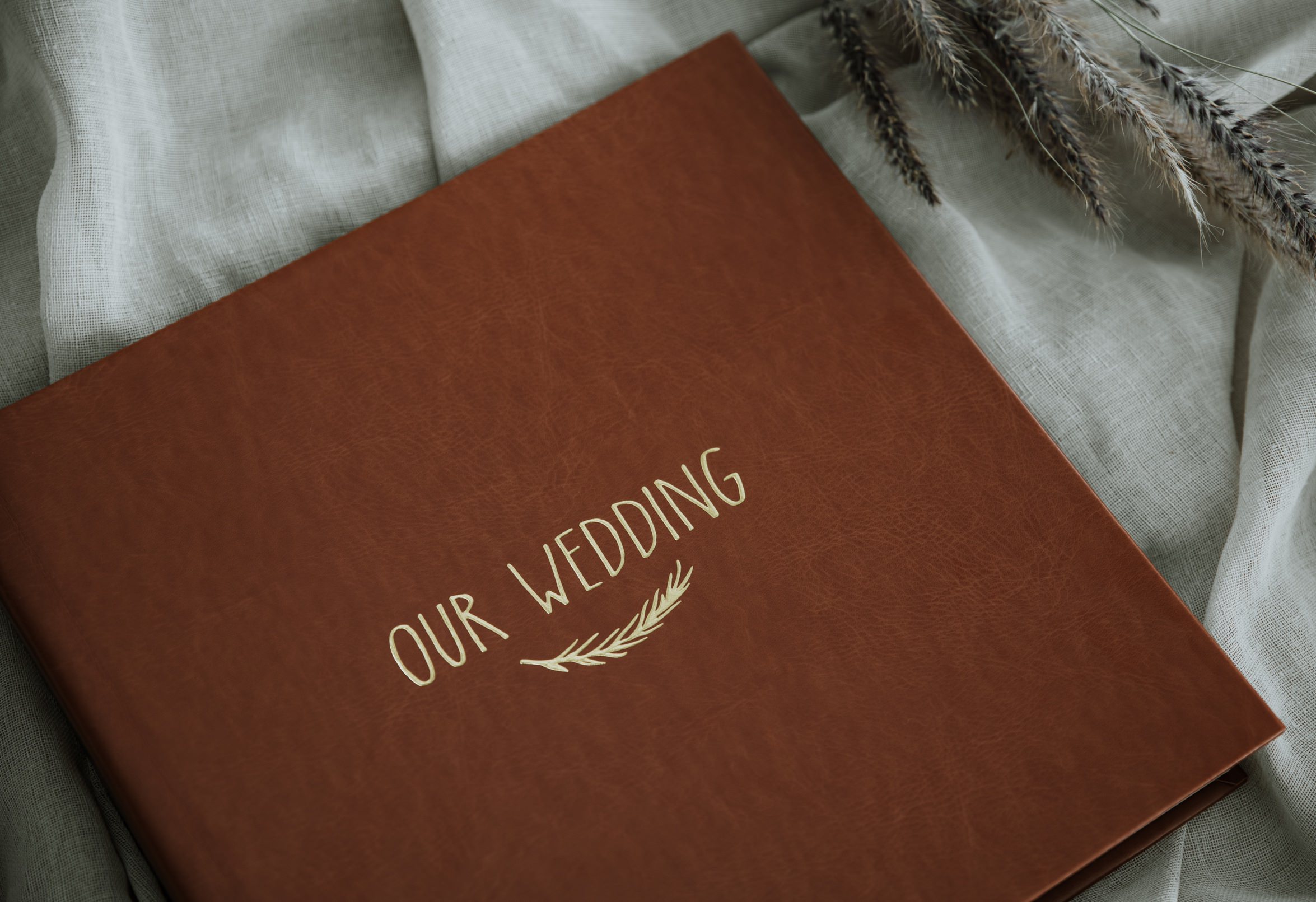 Custom linen and leatherette wedding album covers with parent album options